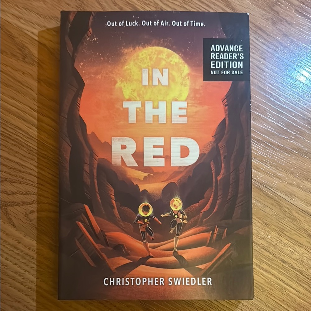 In the Red by Christopher Swiedler - Paperback Copy (Not Used)